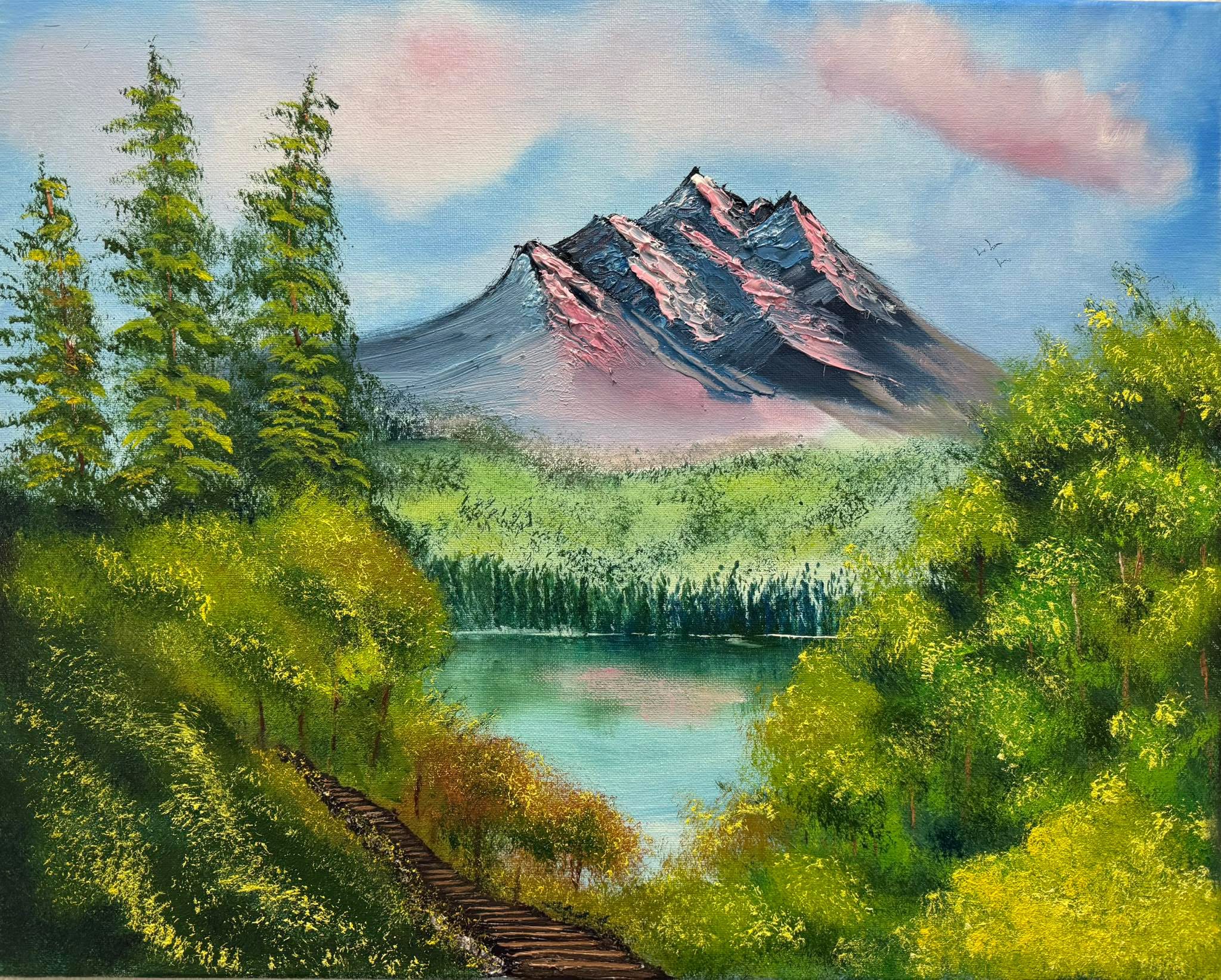 Spring's Embrace: Where Mountains Kiss the Waking Earth